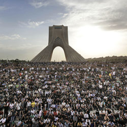 Hundreds of thousands of supporters of leading opposition presidential candidate Mir Hossein Mousavi, who claims there was voting fraud in Friday's election, turn out to protest the result of the election at a mass rally in Azadi (Freedom) square in Tehran, Iran, Monday, June 15, 2009. (AP Photo/Ben Curtis)