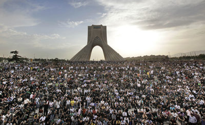 Hundreds of thousands of supporters of leading opposition presidential candidate Mir Hossein Mousavi, who claims there was voting fraud in Friday's election, turn out to protest the result of the election at a mass rally in Azadi (Freedom) square in Tehran, Iran, Monday, June 15, 2009. (AP Photo/Ben Curtis)